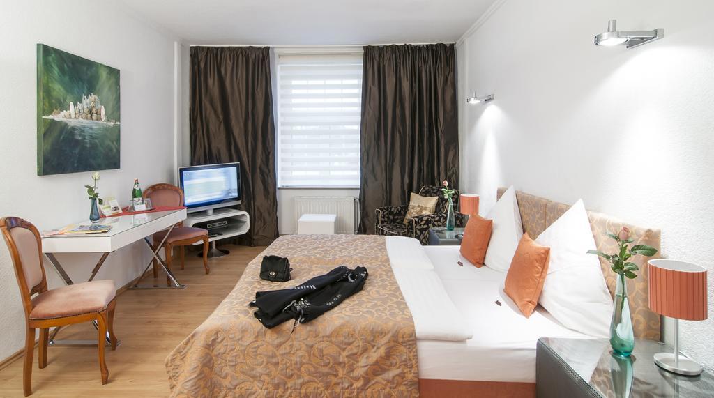 Hotel Service Apartments Am Prinzenplatz Kamp-Lintfort Habitación foto